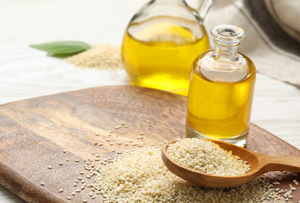 What are the benefits of using sesame oil on skin?